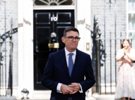 New Prime Minister must support retailers, says the Fed Prime Minister Andy Burnham stands outside No.10 Downing Street.