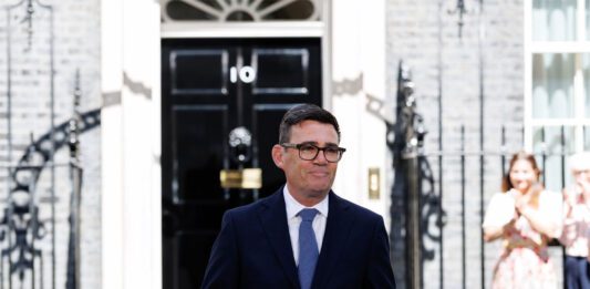 Food and drink firms call on PM to ease industry pressure Prime Minister Andy Burnham stands outside No.10 Downing Street.