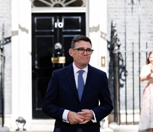 New Prime Minister must support retailers, says the Fed Prime Minister Andy Burnham stands outside No.10 Downing Street.