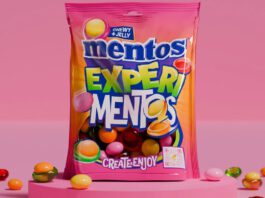 Mentos shakes up sharing segment with Experimentos A bag of Mentos Experimentos sits against a pink background with some of the sweets around the bag.