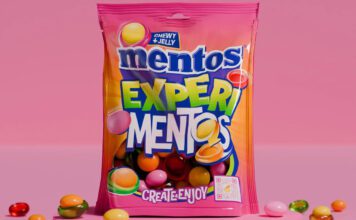 Mentos shakes up sharing segment with Experimentos A bag of Mentos Experimentos sits against a pink background with some of the sweets around the bag.