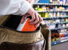 Facewatch to launch real-time police alert capability A person stealing an item from a store shelf and placing it inside their bag.