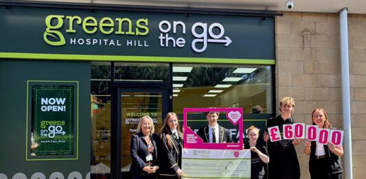 Green’s On The Go marks opening with £2k donation A group of children from Dunfermline High School stand outside Green's On The Go Hospital Hill holding signs and a cheque for £1,000.