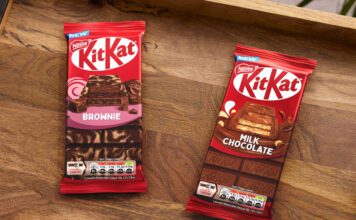 KitKat expands sharing bar range with two new flavours Packs of KitKat Sharing Bars Brownie and Milk Chocolate flavour sit on a wooden tray.
