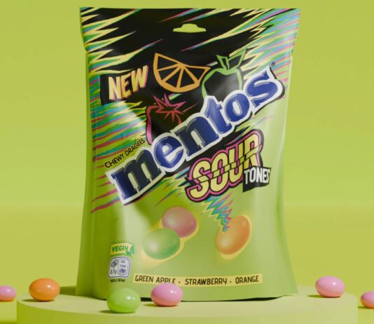 Mentos rolls out new Sour Tones sharing pack format A pack of Mentos Sour Tones Sharing Pack stands against a lime green background with some of the sweets scattered around the bag.
