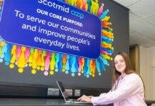Scotmid marks International Intern Day Anna Lodge, Saltire Scholar, sits with a laptop in Scotmid HQ.