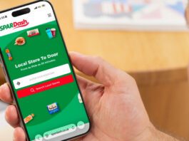 Spar launches new home delivery platform Spar Dash A person holds a mobile phone with the Spar Dash app open on it.