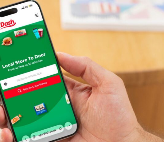 Spar launches new home delivery platform Spar Dash A person holds a mobile phone with the Spar Dash app open on it.