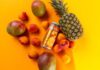 Vault City ramps up sour beer production for anniversary A can of Vault City 999GL sits among different fruit against an orange and yellow background.