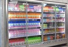 Energy costs push inflation back above 3% An image of a refrigerator unit inside a convenience store with soft drinks inside and doors on the chiller.