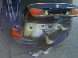 Forecourt Eye offers enhanced tech to combat fuel theft A man fills up plastic containers in the boot of his car with fuel.