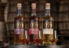 Glasgow 1770 rolls out Batch 2 whisky trio Bottles of Glasgow 1770 Batch 2 sit on a barrel with nosing glasses in front of them with samples of the whiskies inside. (L to R) Glasgow 1770 Sherry Cask Matured, Glasgow 1770 Ruby Port Cask Finish and Glasgow 1770 Bourbon Cask Matured.