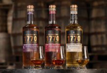 Glasgow 1770 rolls out Batch 2 whisky trio Bottles of Glasgow 1770 Batch 2 sit on a barrel with nosing glasses in front of them with samples of the whiskies inside. (L to R) Glasgow 1770 Sherry Cask Matured, Glasgow 1770 Ruby Port Cask Finish and Glasgow 1770 Bourbon Cask Matured.