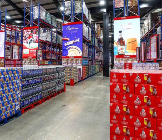 Parfetts introduces new AI system with Cerve Interior image of a Parfetts depot with stacks of products lined up across its aisles.