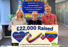 Scotmid raises £22k for Venezuela earthquake appeal Team members from Scotmid Co-op stands holding a banner highlighting a £22,000 donation from Scotimd to the Disasters Emergency Committee Venezuela Earthquake Appeal.