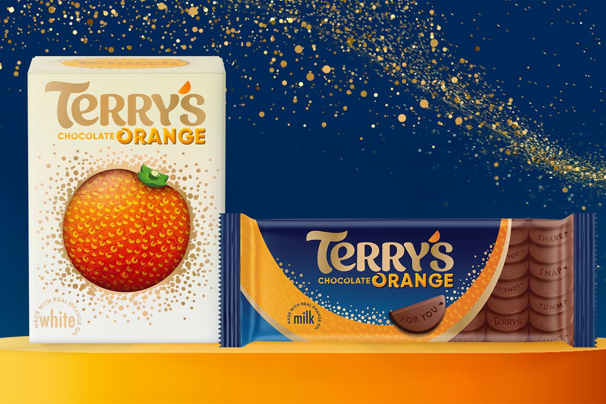 Promotional image for the Terry's Chocolate Christmas range featuring pack shots of Terry's White Chocolate Orange and Terry's Chocolate Orange XL tablet bar.