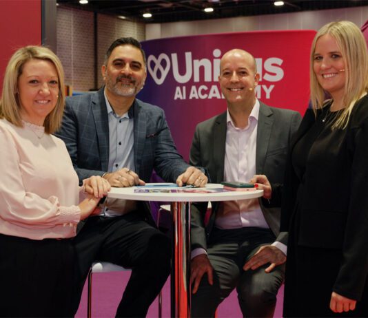 Promo delivers sales uplift for Unitas members (L to R) Ashleigh Cheetham, Gurms Athwal, David Cooke and Belinda Parkinson sit together at a table during the Unitas trade exhibition.