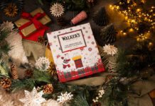 Walker’s Shortbread Advent Calendar returns for 2026 A Walker's Shortbread Advent Calendar sits in the middle of a Christmas scene with presents, decorations and lights.