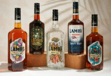 LMB UK secures Lamb’s Rum range Bottles of Lamb's Rum variants sit against a white background with palm leaf shadows over them.