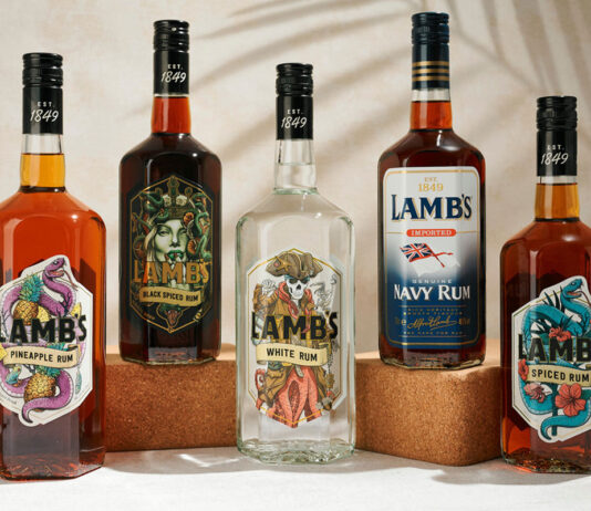 LMB UK secures Lamb’s Rum range Bottles of Lamb's Rum variants sit against a white background with palm leaf shadows over them.