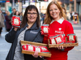 McGhee’s teams up with Brodies to save the tea break Mina MacKenzie, retail partner manager at Brodies, and Aisling McGhee, commercial director at McGhee's, stand outside Glasgow Central Station holding packs of McGhee's individual biscuits with Brodies tea bag attached to it. Each also hold a wicker basket with more biscuit and tea combos.