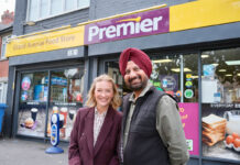 National Lottery retailers raise over £10billion for Good Causes Kulijt Athwal, owner of Premier Grand Avenue Stories in Cardiff, and actress Joanna Page stand outside the Premier store.