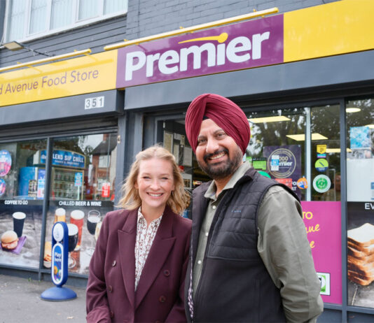 National Lottery retailers raise over £10billion for Good Causes Kulijt Athwal, owner of Premier Grand Avenue Stories in Cardiff, and actress Joanna Page stand outside the Premier store.