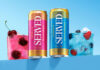 Served rolls out Vodka+ range across Booker Cans of Served Vodka+ stand on a blue table against a blue background with the drinks poured out into glasses next to them with pieces of fruit inside.