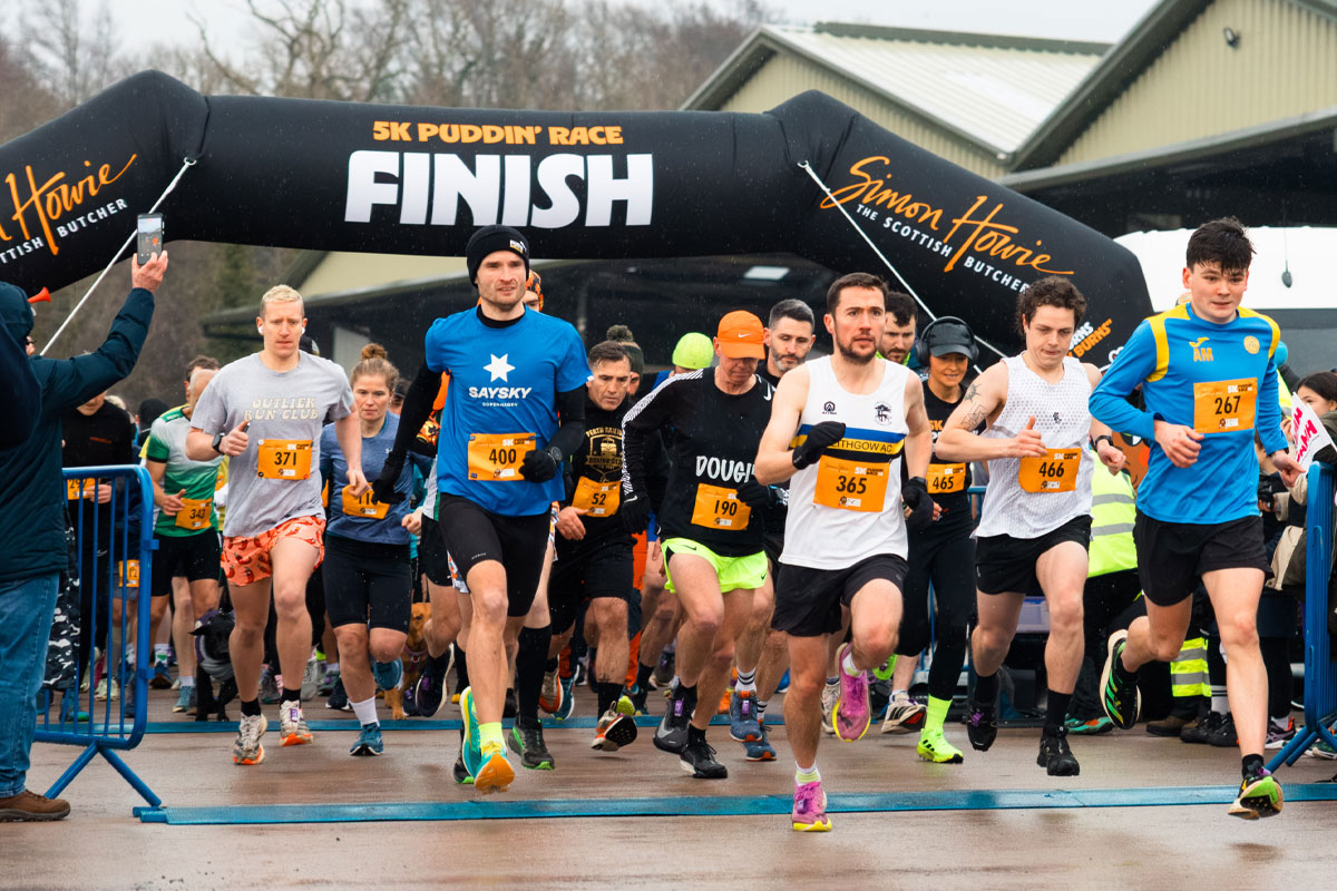 A group of runners set off on the Simon Howie 5k Puddin' Race in 2026.
