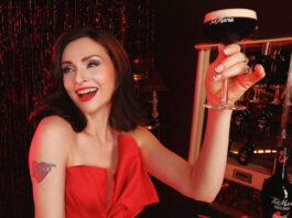Tia Maria reunites with Sophie Ellis Bextor in festive campaign Sophie Ellis Bextor is in a dressing room toasting with a martini coupe glass with an Espresso Martini inside. There is a bottle of Tia Maria on the dressing table and the glass has the Tia Maria logo on it.