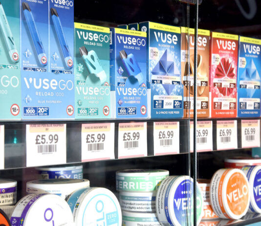 Industry voices concerns over vaping display consultation A cabinet with vape devices inside it.