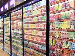 UKVIA calls for a changed vaping policy as UK smoking rates fall A vapes cabinet display with an expansive range of options.