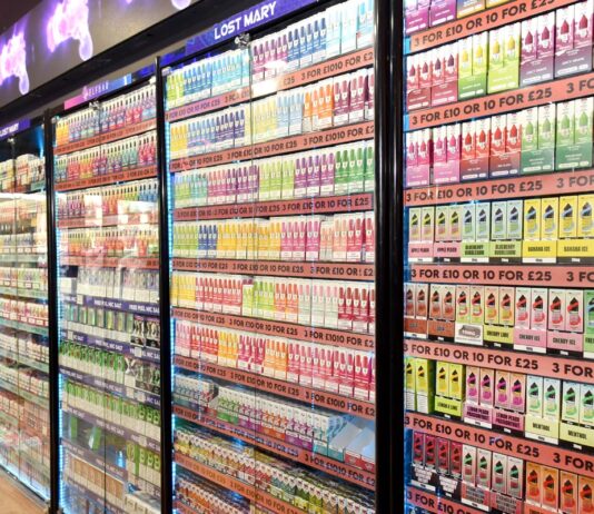 UKVIA calls for a changed vaping policy as UK smoking rates fall A vapes cabinet display with an expansive range of options.